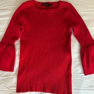 Karen Millen Woman’s Rib Knit top with Long Fluted Sleeve. Size Large. Red.